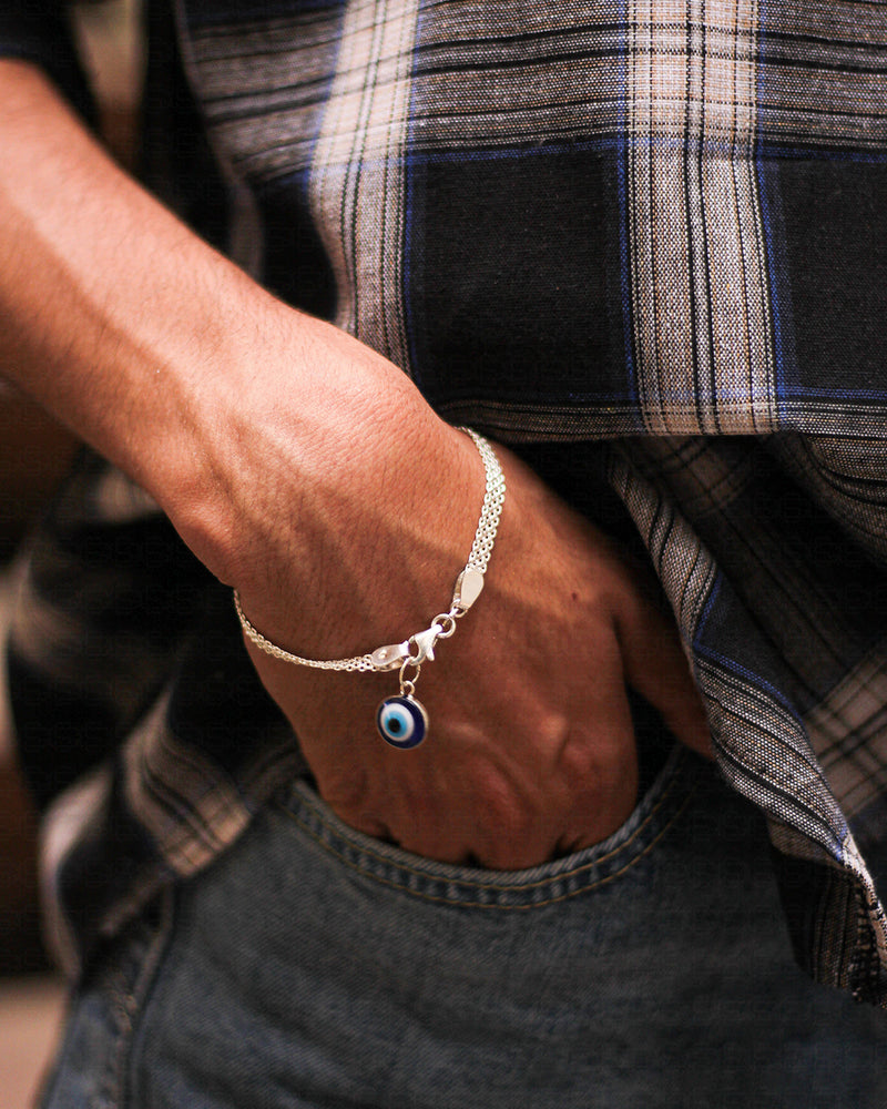 Silver bracelet with pendant in the shape of an eye